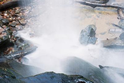 Under the waterfall
